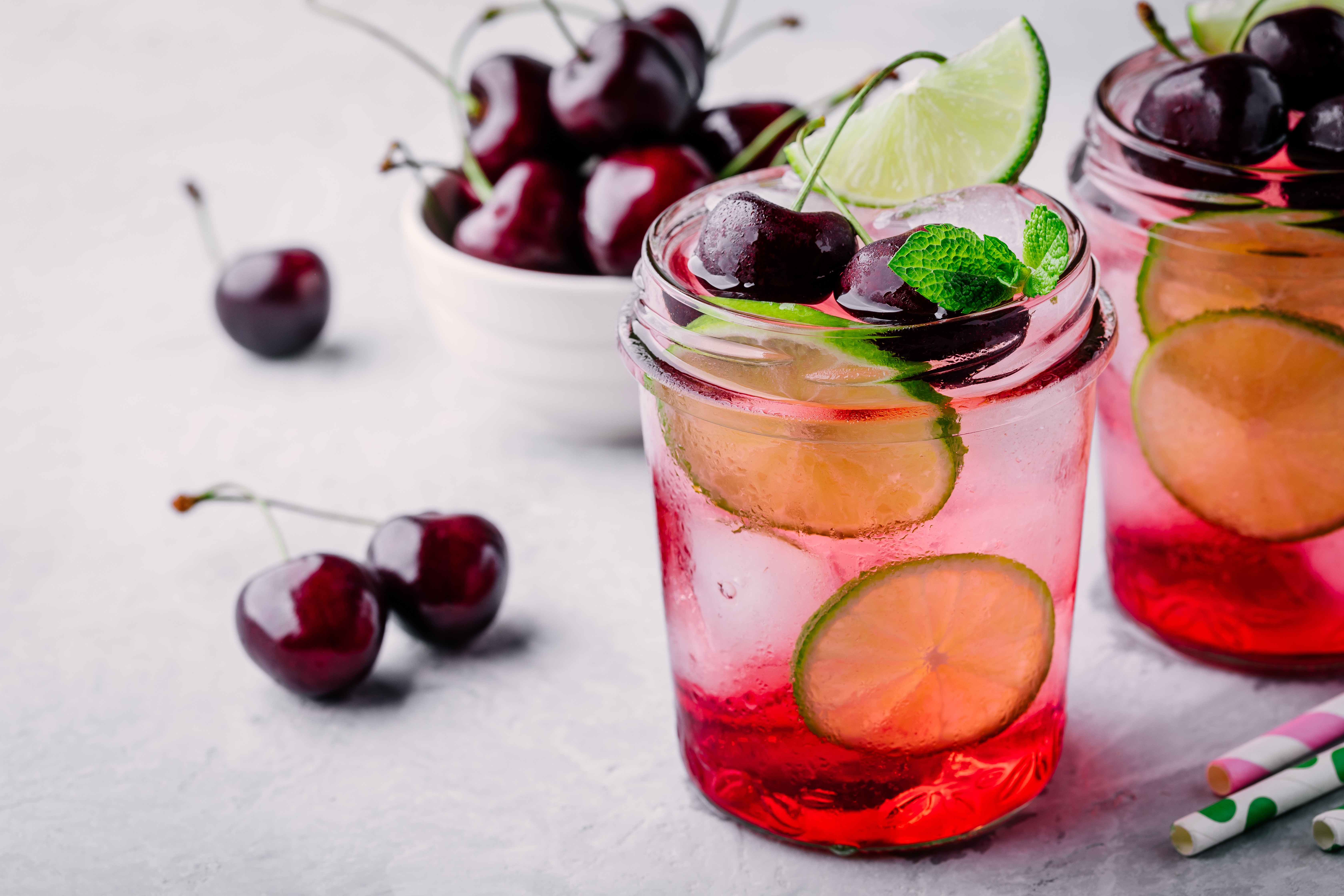 Refreshing cold summer drink cherry and lime lemonade